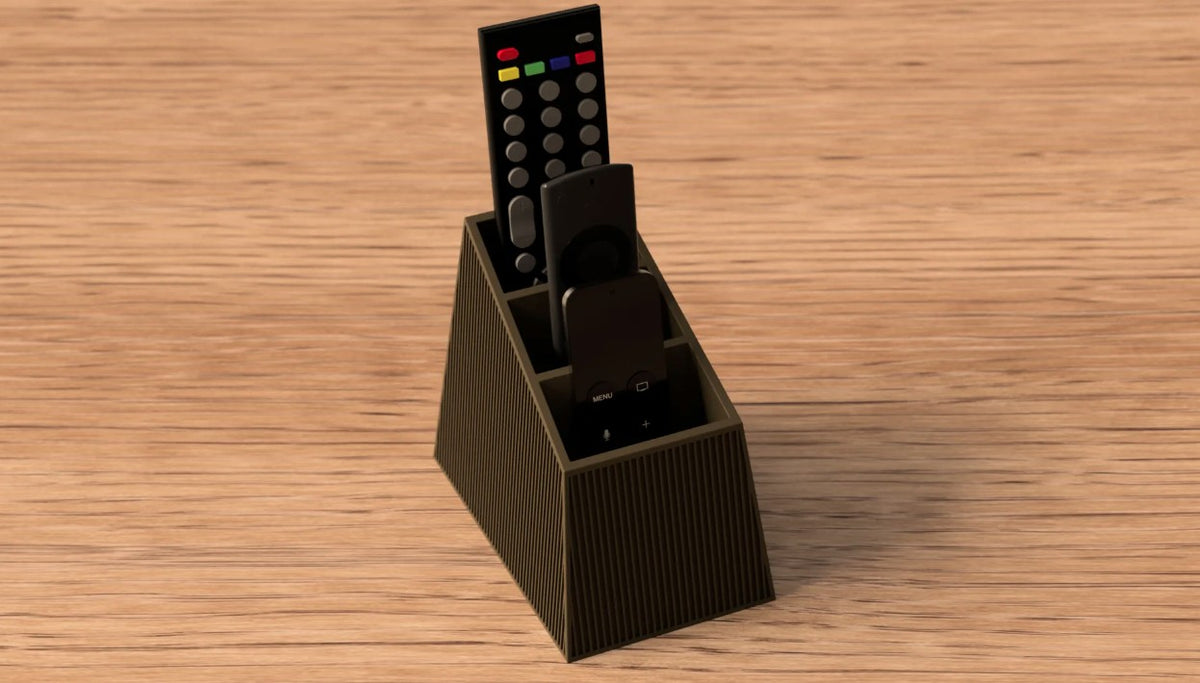 Remote Organiser holding remote controls