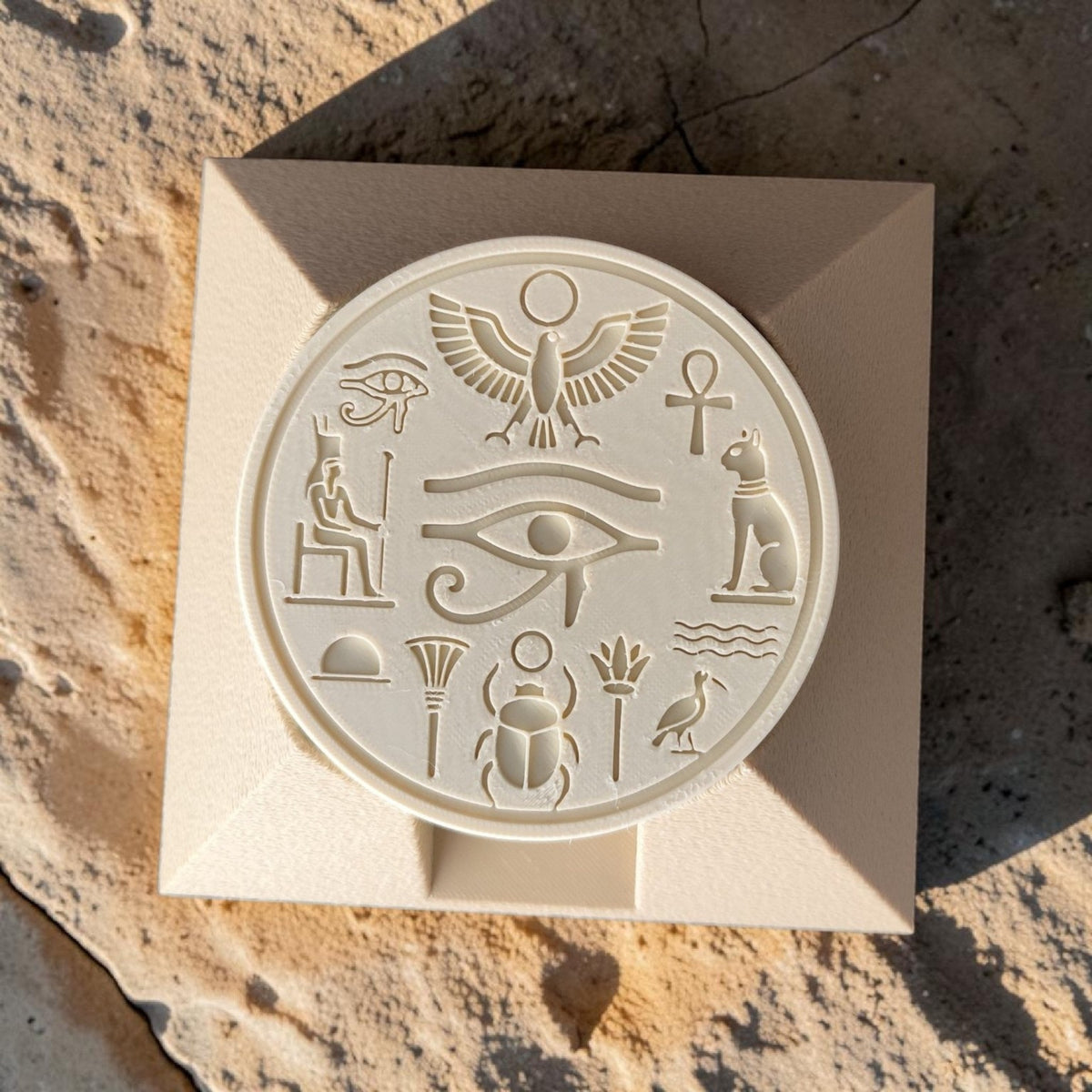 Ancient Egyptian coaster set close-up showing hieroglyphic design