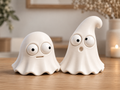 Pair of white Goofy Ghost Halloween decorations with moving eyes
